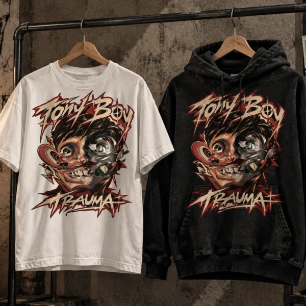 Mockup realistico di T-shirt bianca e hoodie nera Tony Boy con grafica Trauma, appese a grucce in legno su un rack industriale.